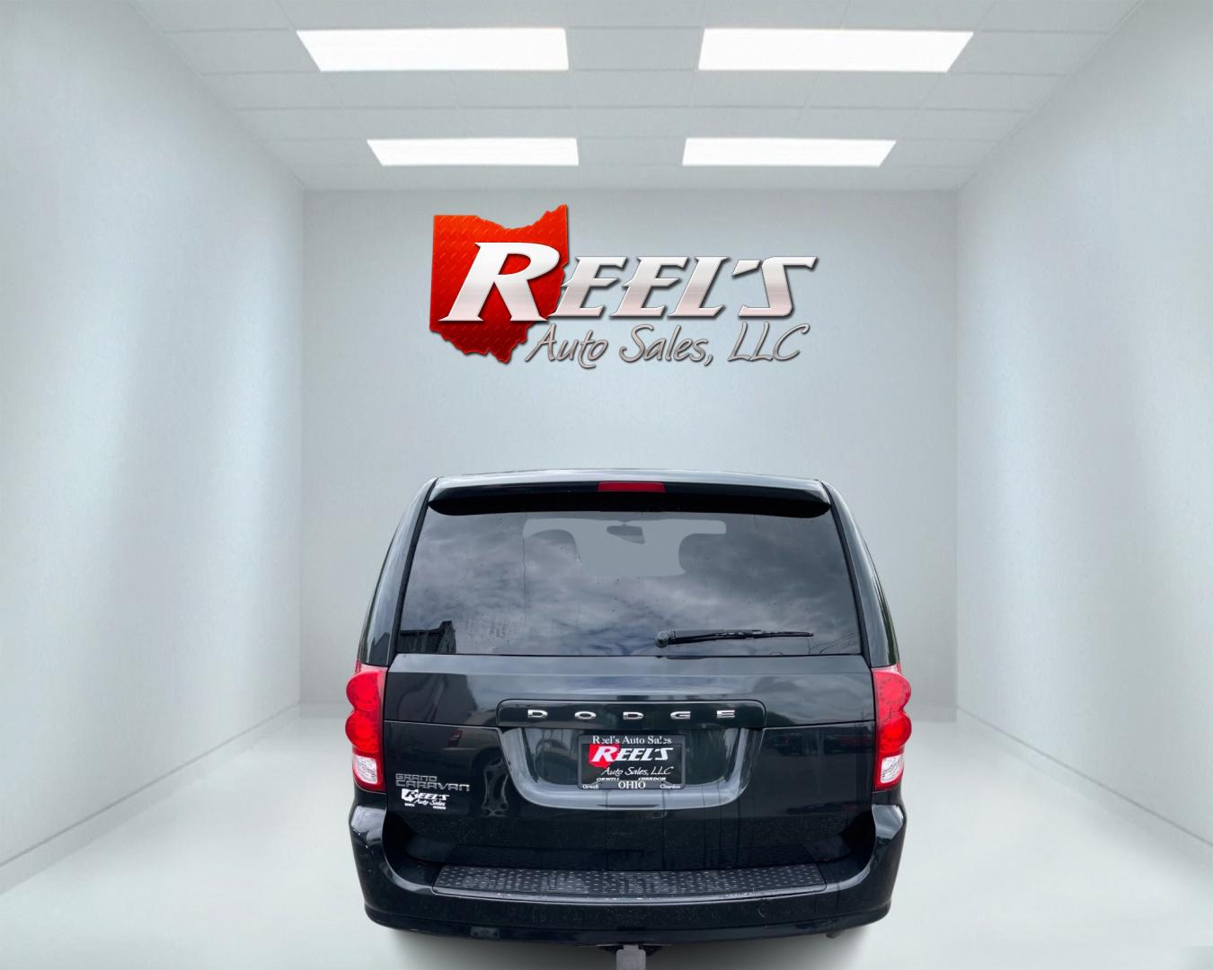 2015 Black /Black Dodge Grand Caravan SE Black Top (2C4RDGBG1FR) with an 3.6L V6 DOHC 24V FFV engine, 6-Speed Automatic transmission, located at 11115 Chardon Rd. , Chardon, OH, 44024, (440) 214-9705, 41.580246, -81.241943 - Photo#6